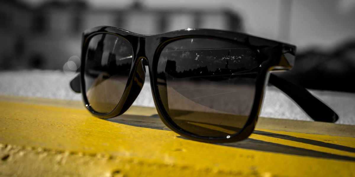 Protect Your Eyes in Style: Prada Black Sunglasses at Turakhia Opticians
